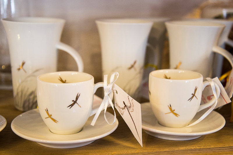 Espresso cup and saucer with golden dragonflies